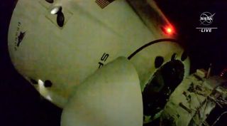 SpaceX Crew-1 Dragon Resilience is seen immediately after undocking from the International Space Station Harmony module on May 1, 2021 to begin the journey to Earth with four astronauts on board.