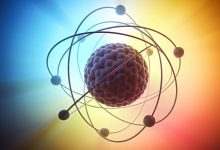 Graphic illustration of an atomic model with a nucleus containing protons and neutrons and electrons